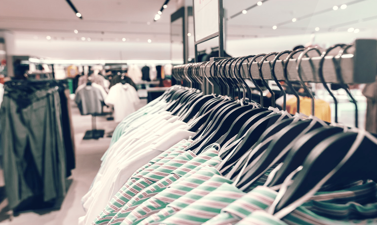 fashion brand team using PLM software to manage tech packs and production workflows