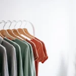 Fashion brand team reviewing garment samples and production documents during the product development process