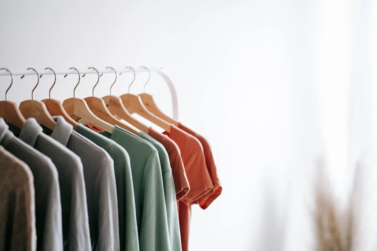 Fashion brand team reviewing garment samples and production documents during the product development process
